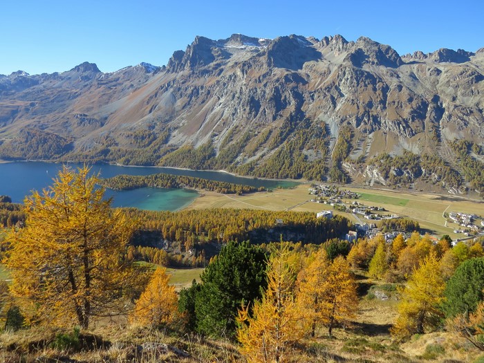 Autumn landscape with mountains and lake in Graubünden, Switzerland