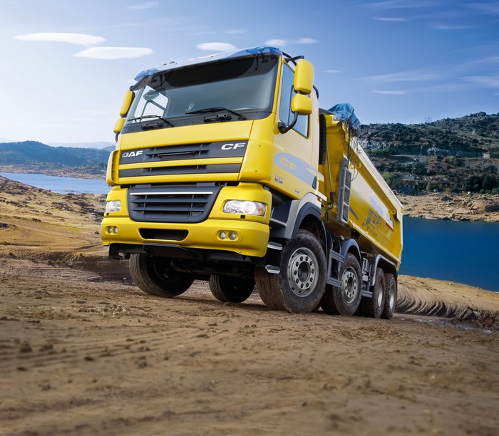 Yellow DAF CF dump truck on dirt road