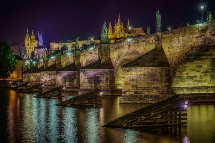 Charles Bridge at night in Prague, Czech Republic
