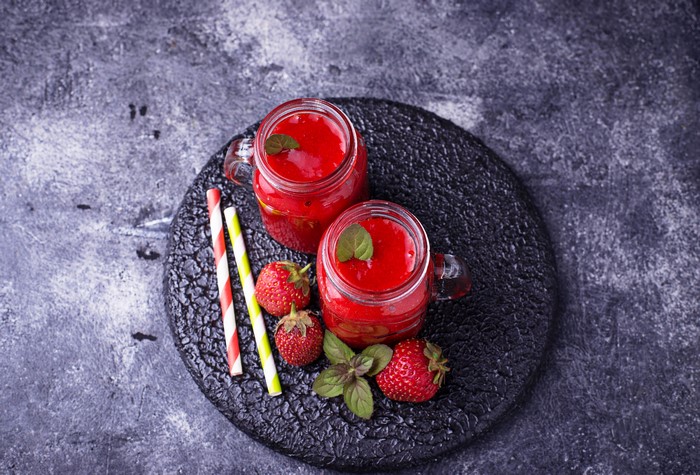 Strawberry Juice in Jars with Strawberries