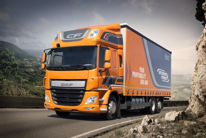 Orange DAF CF Truck on a Mountain Road