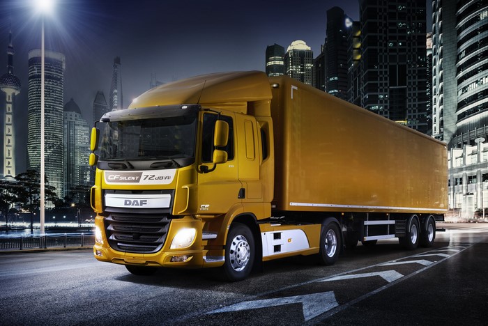 Yellow DAF CF Silent 72 dB(A) Truck in City at Night