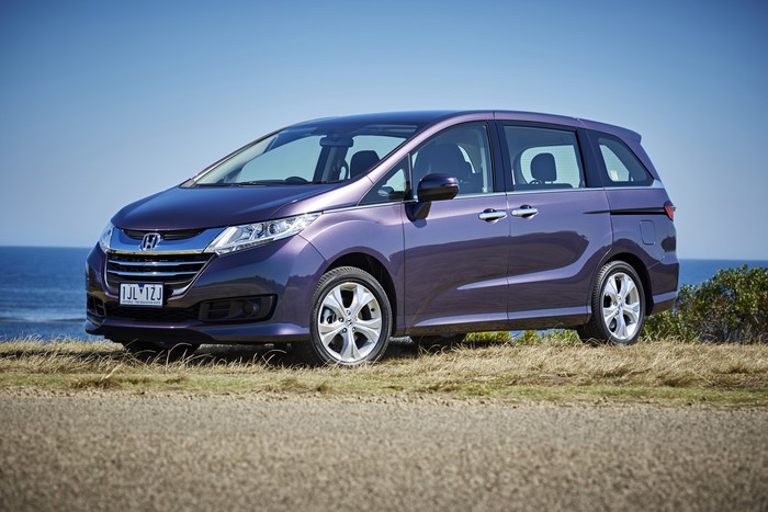 Violet 2014-17 Honda Odyssey VTi parked by the sea