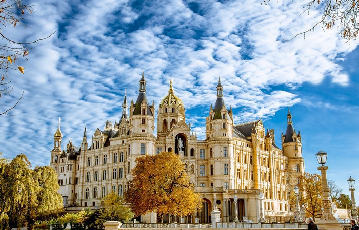 Schwerin Castle in Autumn under Blue Sky