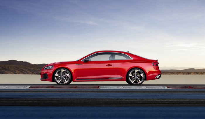 Red Audi RS5 Coupe on a Track