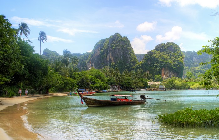 Longtail boats in a tropical bay in Thailand