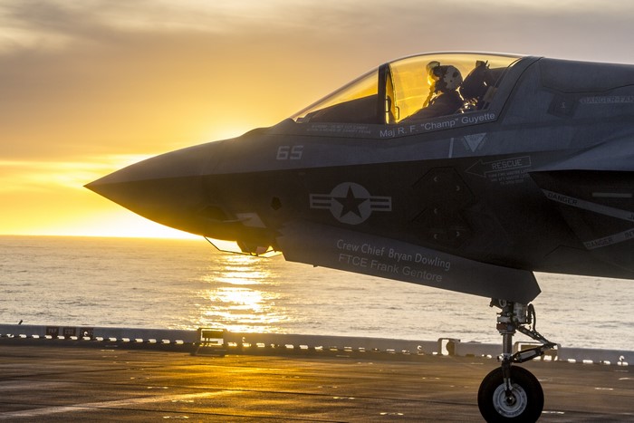 F-35B Fighter Jet on Aircraft Carrier at Sunrise