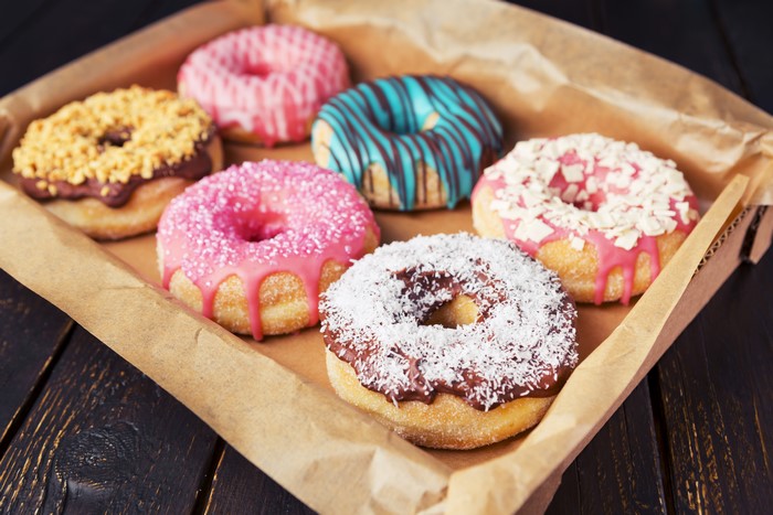 Assortment of colorful donuts in a box