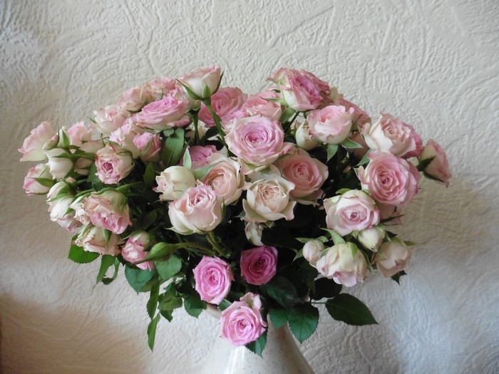 Bouquets of pink and white roses
