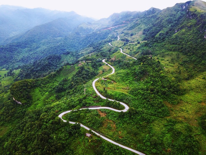 Winding road through green mountains in Bac Can, Vietnam
