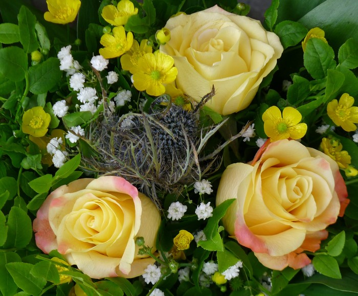 Yellow roses and wildflowers bouquet