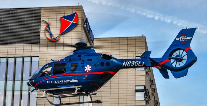 Blue Life Flight Network helicopter N835LH near building