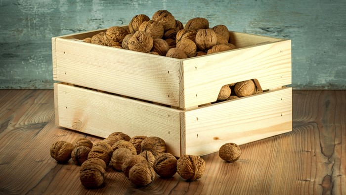 Walnuts in a wooden crate