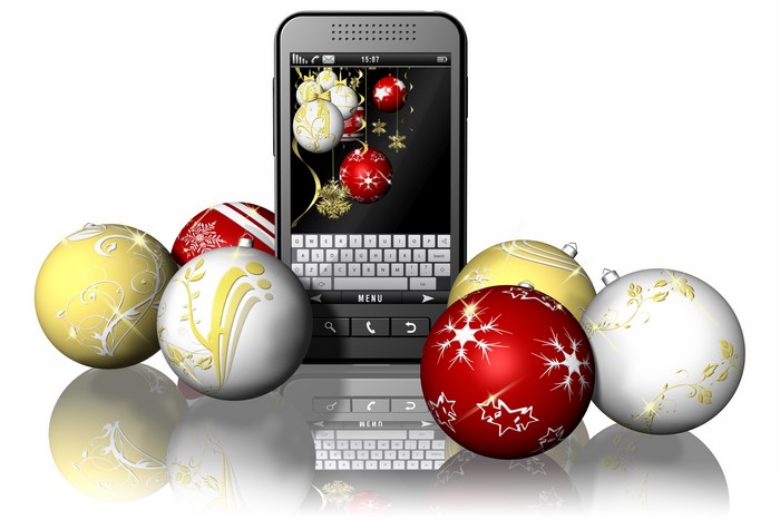 Smartphone with Christmas ornaments