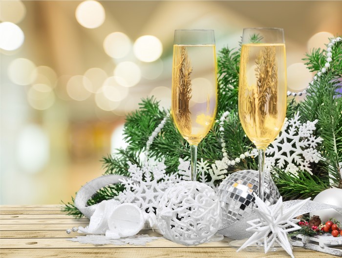 Champagne glasses with Christmas decorations