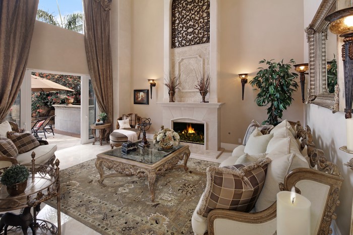 Living room with fireplace and patio access
