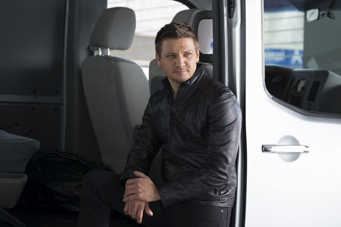 Jeremy Renner in a van