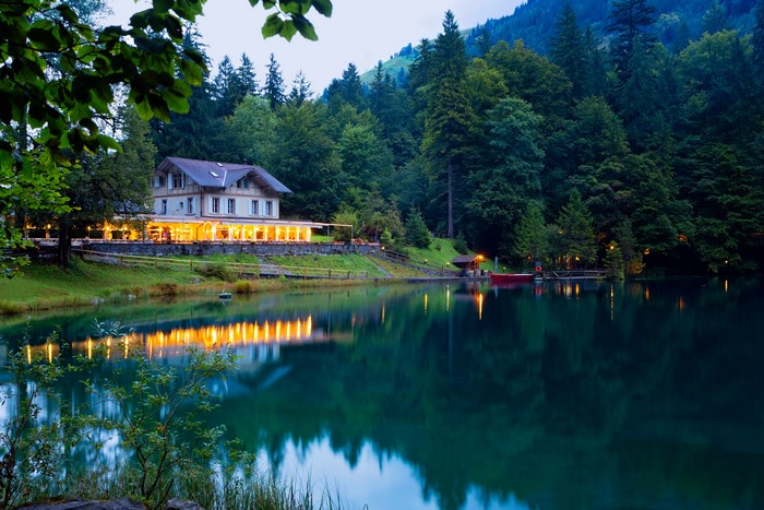 House on a lake in Kander Valley, Switzerland