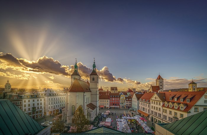 Regensburg, Germany with sun rays over buildings