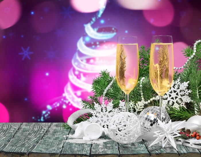Champagne glasses with Christmas decorations
