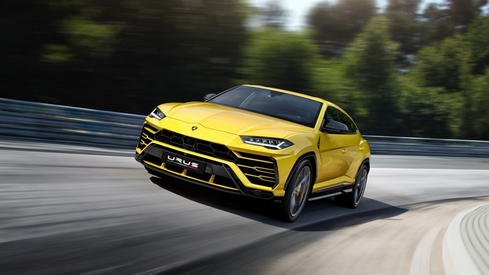 Yellow Lamborghini Urus 2018 on a Racetrack