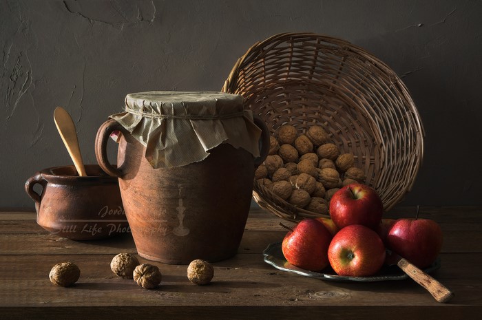 Still life with apples, walnuts, and pottery