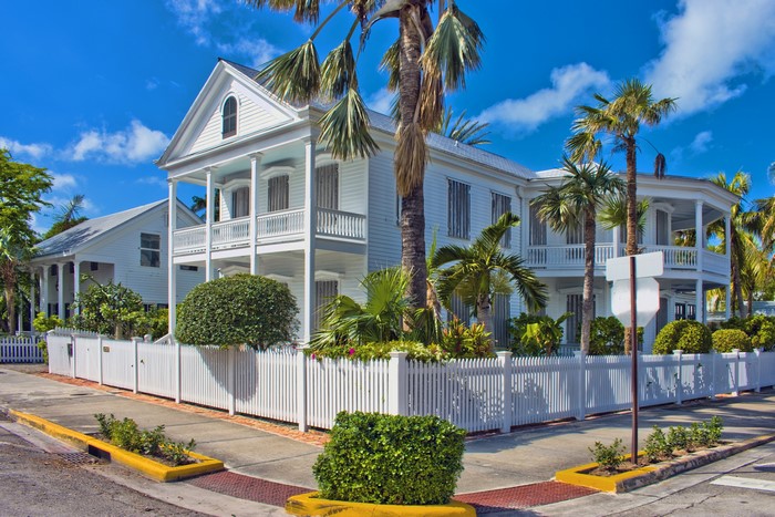 White Victorian House with Palm Trees in Key West, Florida