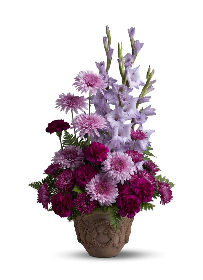 Floral arrangement with gladiolus, chrysanthemums, and carnations in a vase