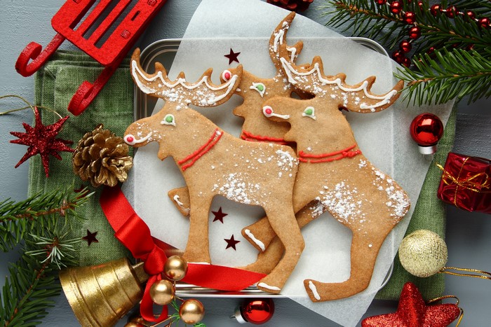Christmas gingerbread deer cookies with festive decorations