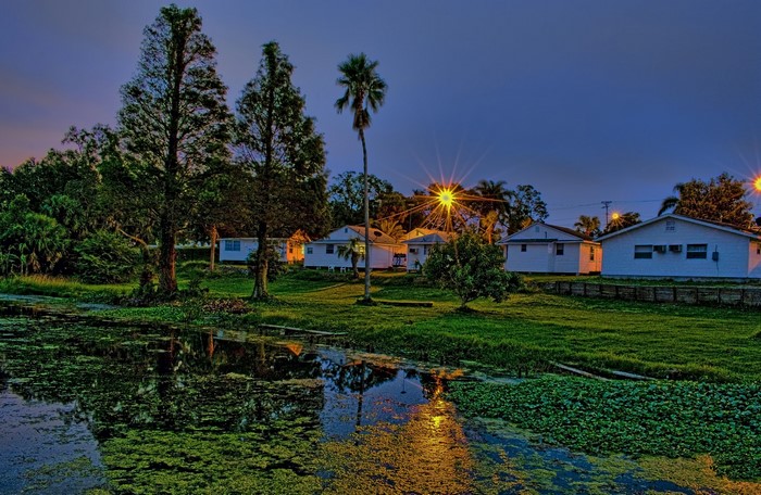 Houses by a pond at dusk in Florida