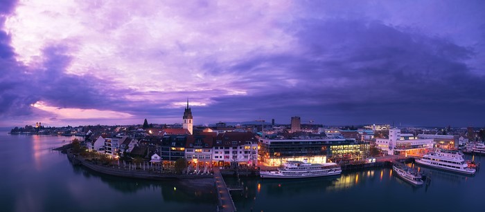 Friedrichshafen Germany waterfront at dusk with boats