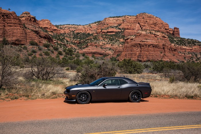 Grey Dodge Challenger 392 HEMI Scat Pack Shaker parked on dirt road