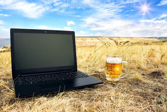 Laptop and Beer in a Field
