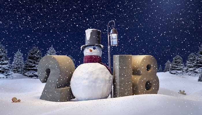 Snowman and 2018 numbers in a snowy landscape
