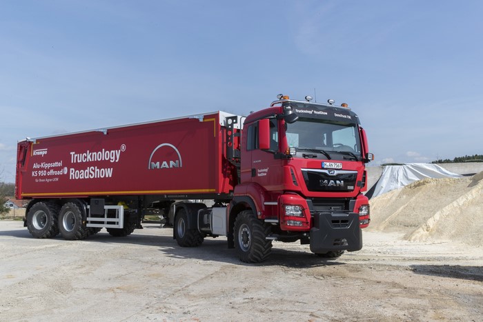 Red MAN Truck and Krampe Trailer