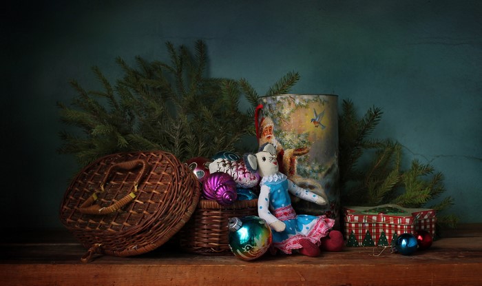 Christmas still-life with ornaments and a doll