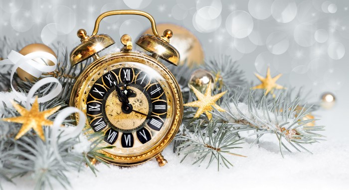 Vintage alarm clock with Christmas decorations