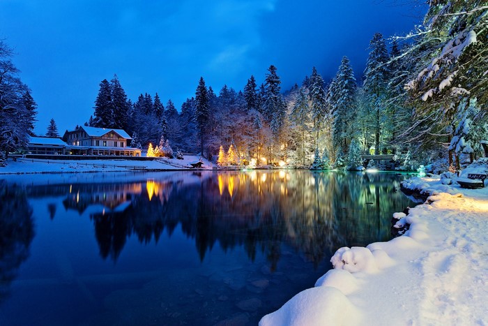4K Winter Evening at Lake with Snow-Covered Trees and Houses in Switzerland