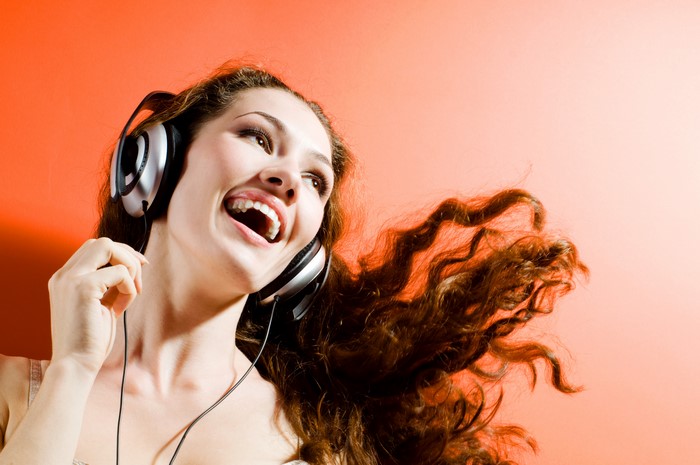Woman with headphones enjoying music