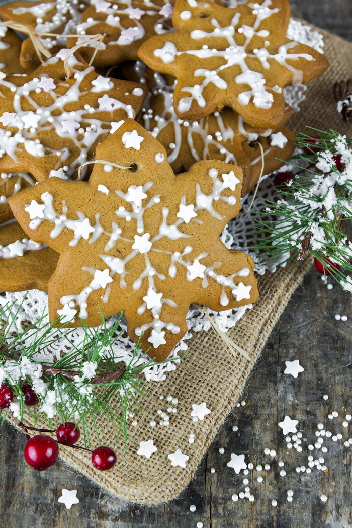 Christmas snowflake cookies with icing and sprinkles