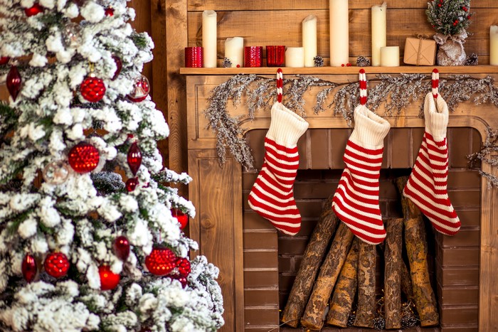 Christmas tree and fireplace with stockings