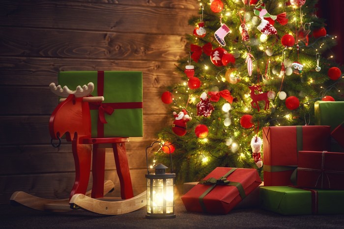 Christmas tree with gifts and a rocking deer