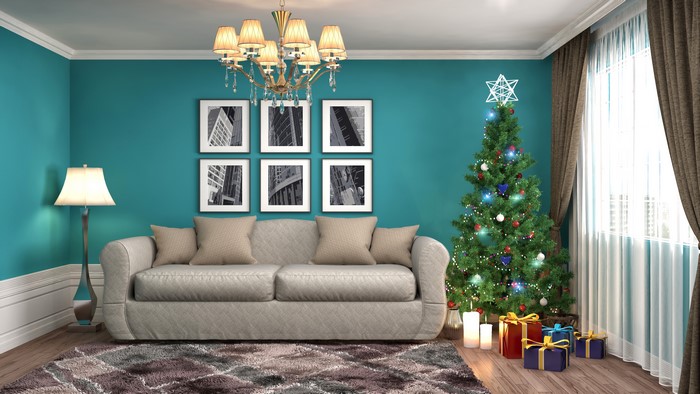 Living room with Christmas tree and sofa