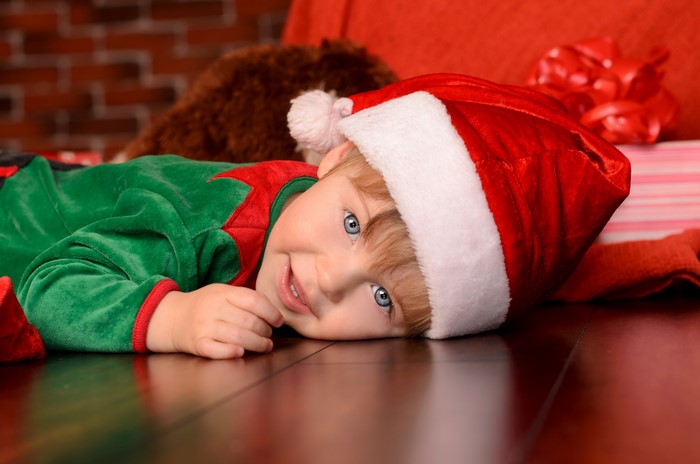 Boy in Elf Costume and Santa Hat