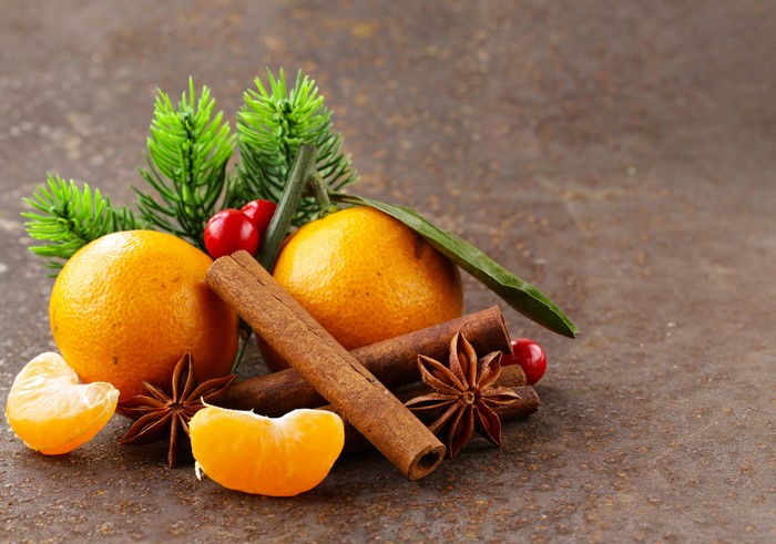 Christmas still life with oranges, cinnamon, and star anise