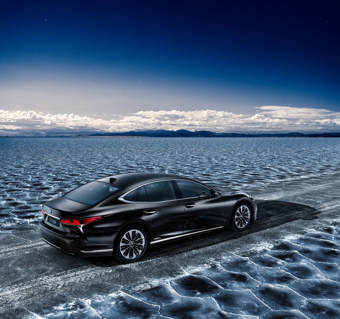 Black Lexus LS 500h on a salt flat
