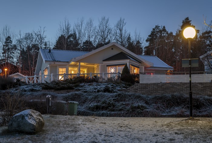 House in Sweden at dusk in winter