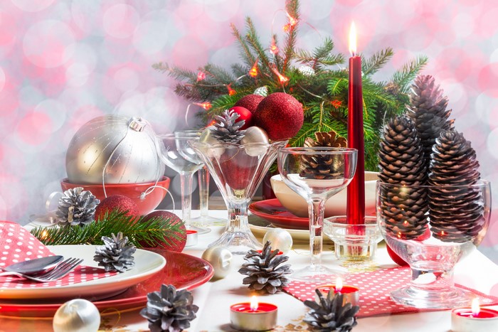 Christmas Table Setting with Ornaments and Candles