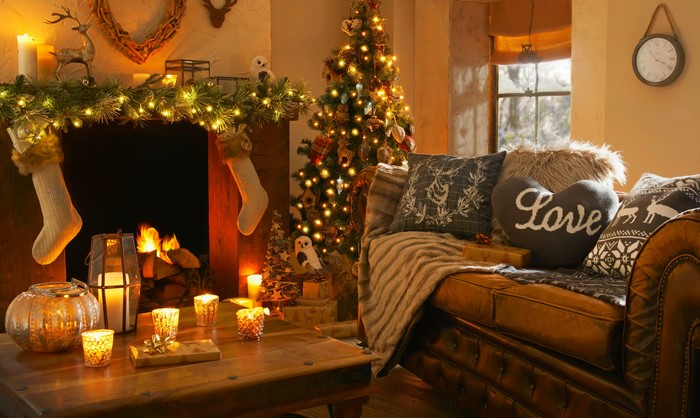 Christmas living room with fireplace and sofa