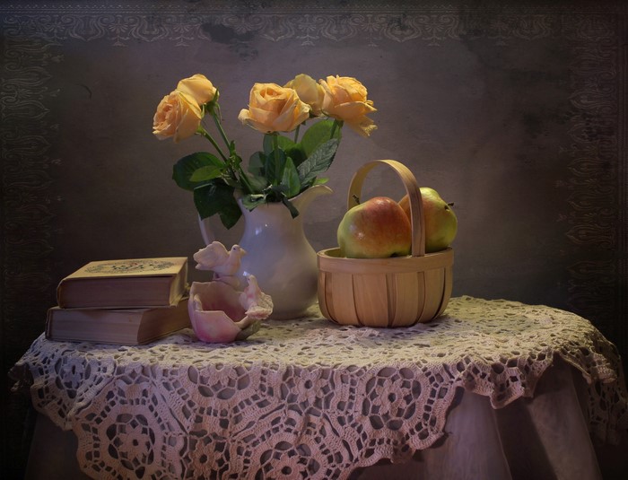Still-life with yellow roses, apples, books, and a bird figurine